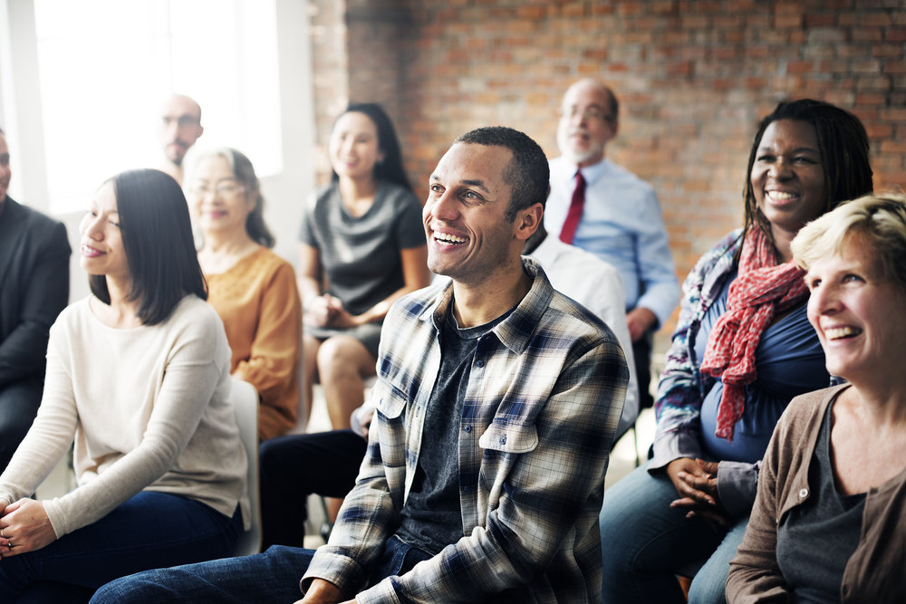 image of parents gathered at a meeting