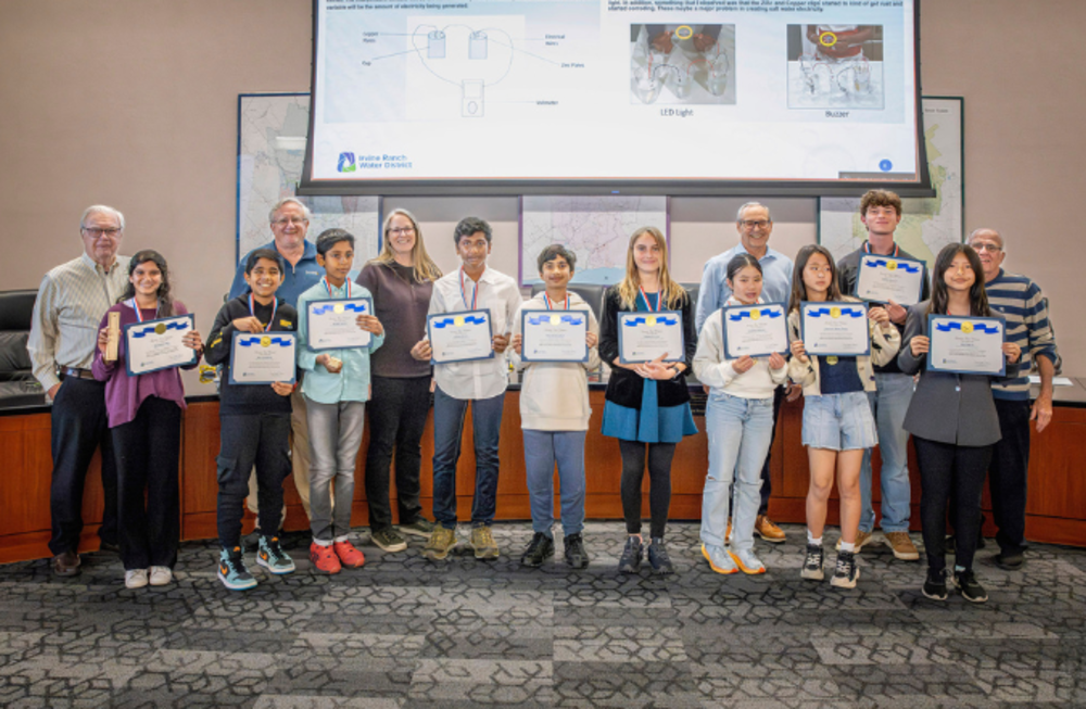 Students holding certificates at Irvine Ranch Water District