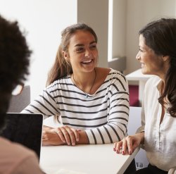 student talking with parent